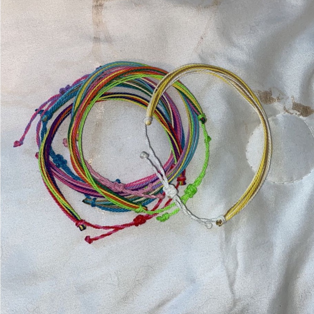 Yarn bracelets. Multi colored never worn.